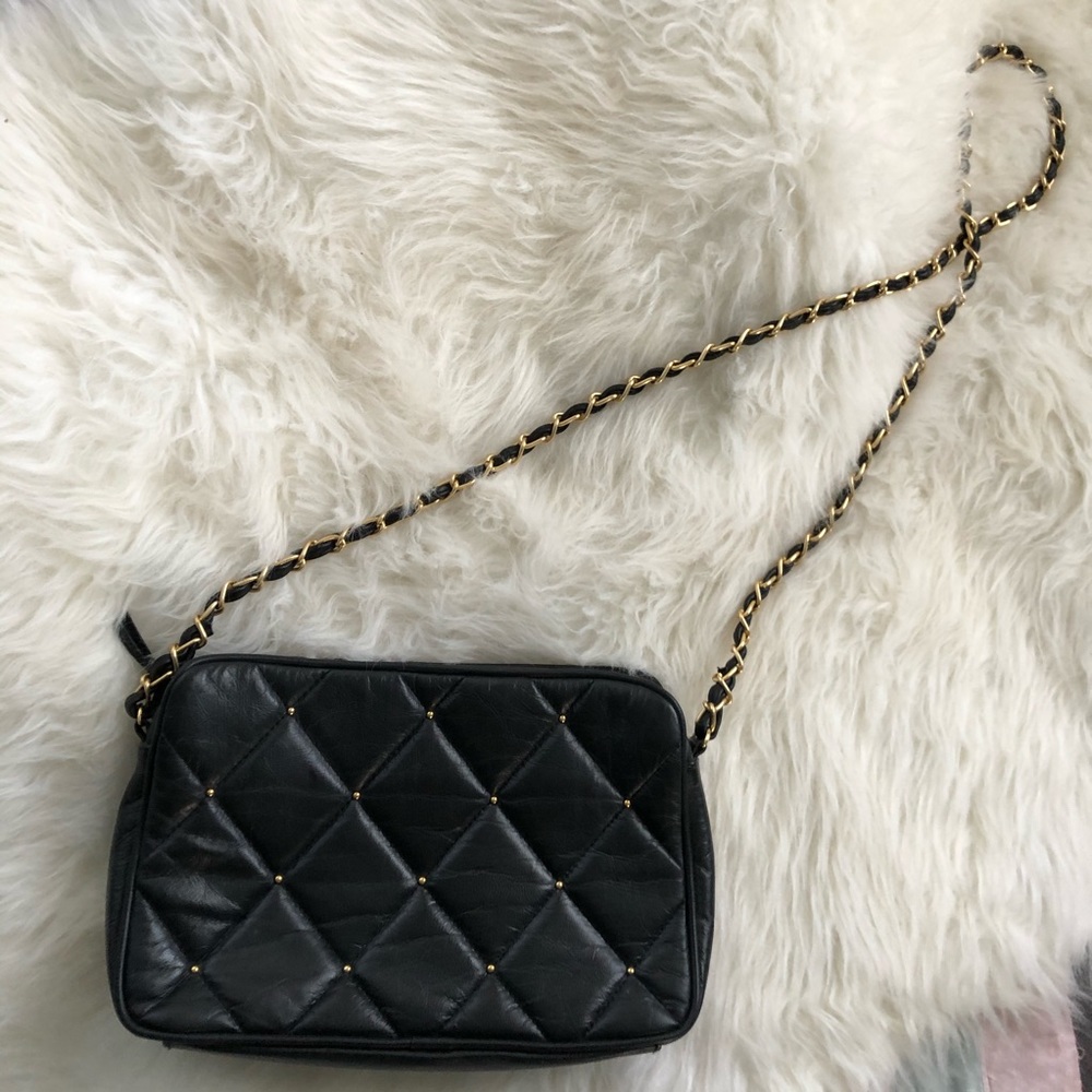 Vintage pleated black faux leather handbag